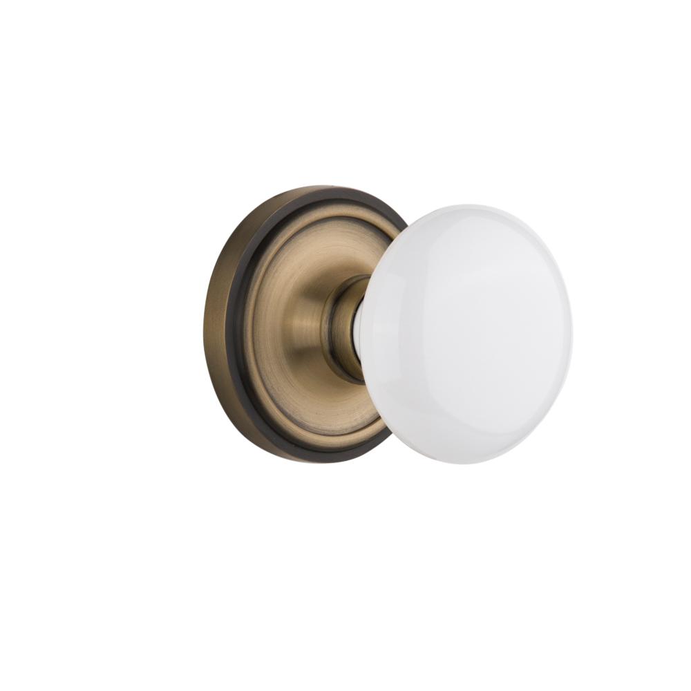 Nostalgic Warehouse CLAWHI Single Dummy Classic Rosette with White Porcelain Knob in Antique Brass